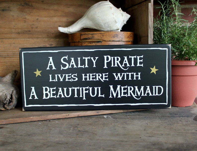 A Salty Pirate lives here with A Beautiful Mermaid