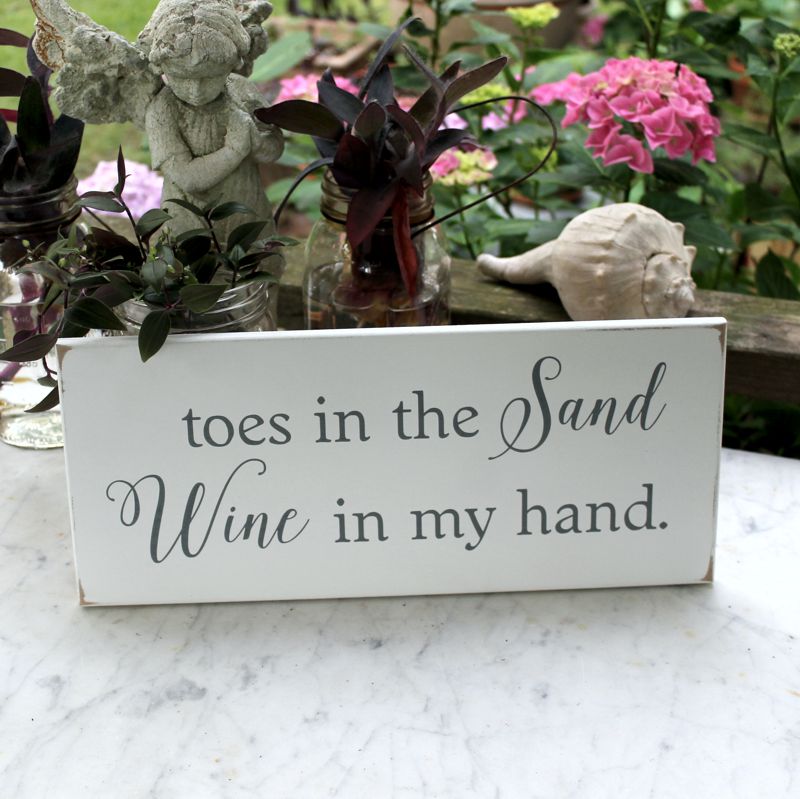 Summer pleasures wood sign Toes in the sand. Wine in my hand. Worn white finish with gray lettering.  Available in several sizes and colors.