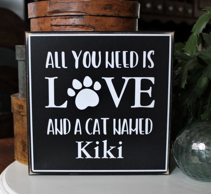 All You Need is Love And a Cat named.... Give us your cat's name and we will create a custom sign just for you. and your Kitty! Also a great gift idea for friends and family who have a cat that is so loved. Available in 2 sizes and several colors. Square black worn finsh sign with white lettering.