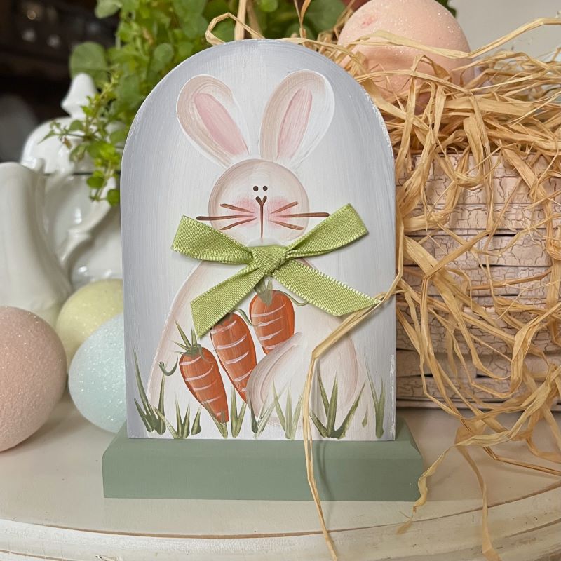 Arched mini sign on a sage wood base.  White shaded background with a hand painted bunny with carrots.  4 inches tall and 3 inches wide. Perfect for a tiered tray display. Spring decor. Easter decor.