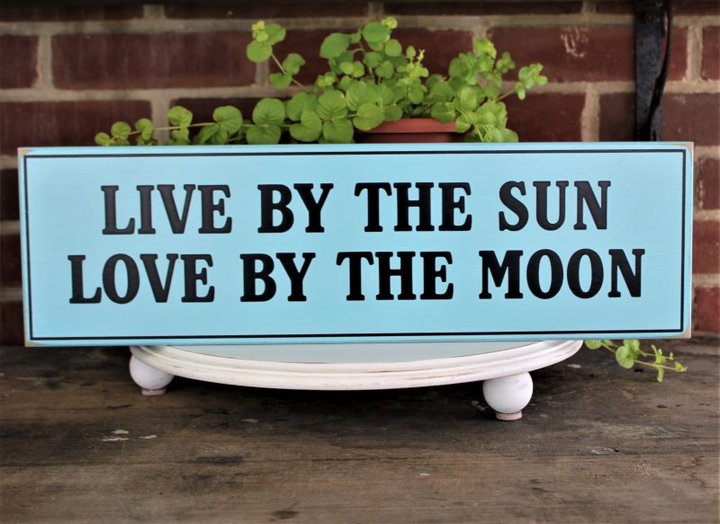 Live by the Sun. Love by the Moon