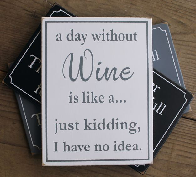 a day without wine a 9x12 inch handcrafted wood sign.
