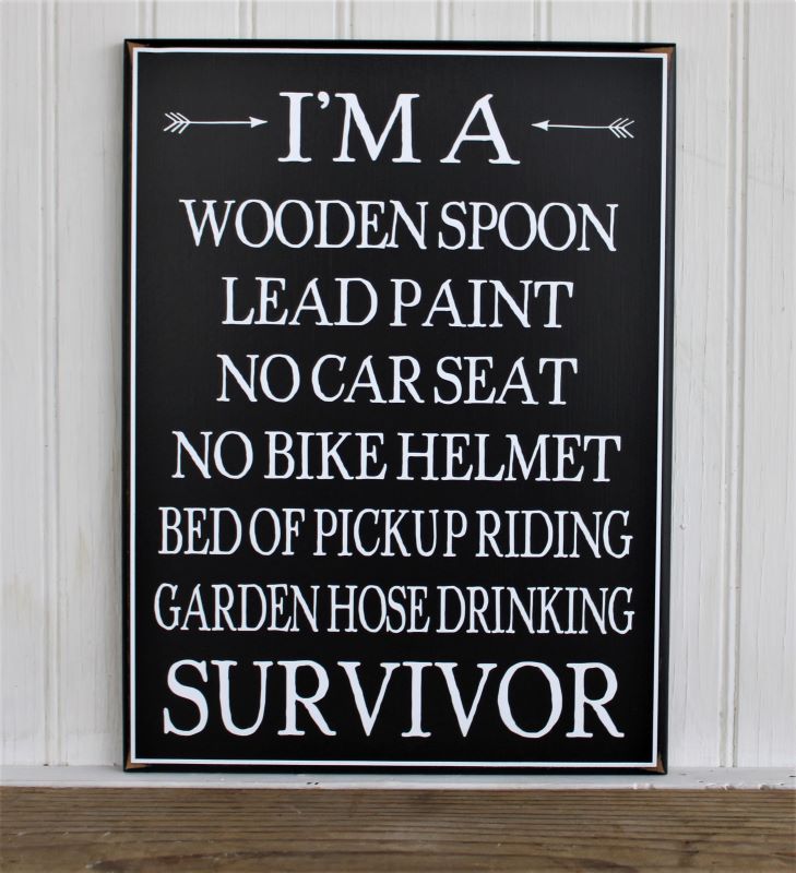 I'm a Survivor Wooden Spoon-Lead Paint-No Car Seat-No Bike Helmet-Bed of Pick Up Riding- Garden Hose Drinking. For Baby Boomers and Generation X Handcrafted on a black worn finish with white lettering. Sign measures 9x12 inches.
