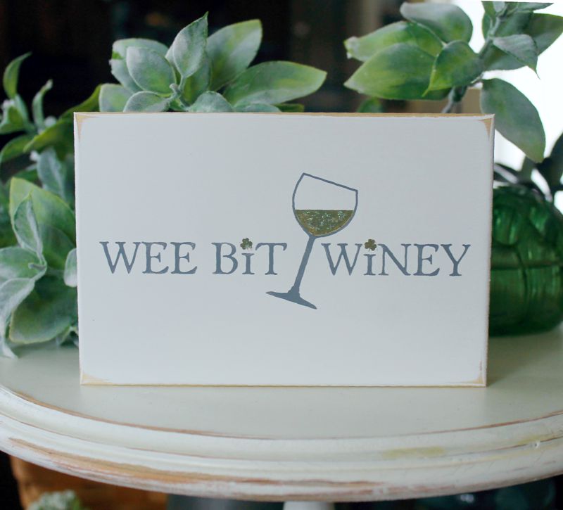 4x6 inch wood sign.White worn finish with gray letters and a wine glass with green wine. 